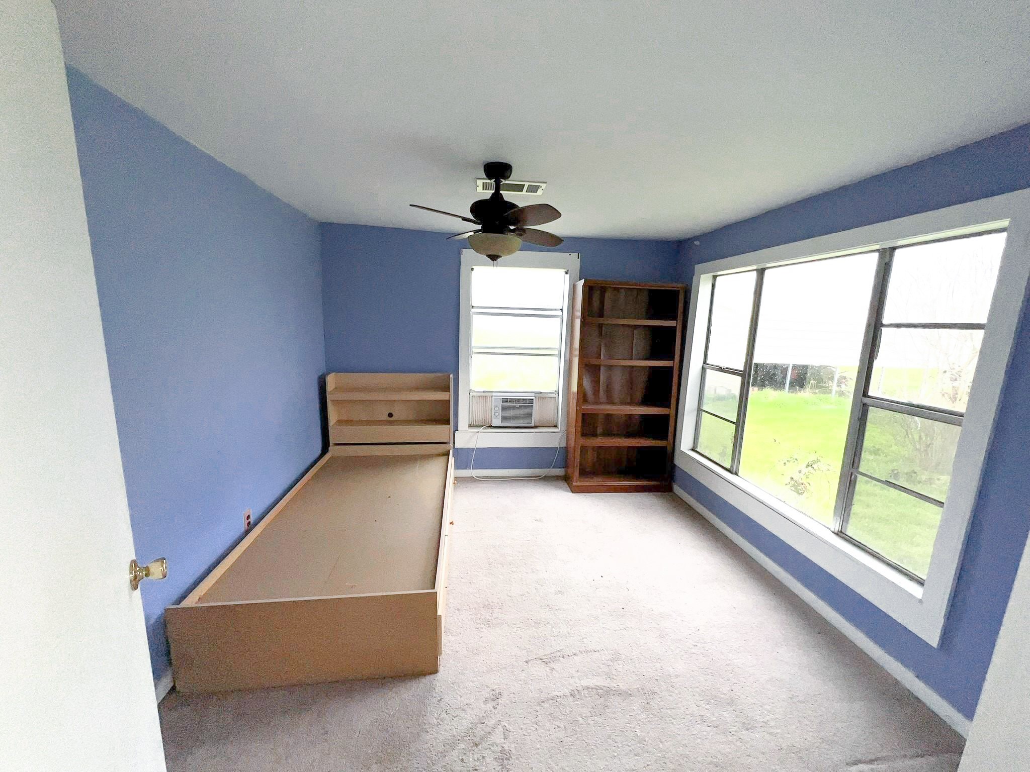 38440 Fisk Lane Pattison, TX 77423 - Photo 19 of 34 wooden floor in an empty room with a window