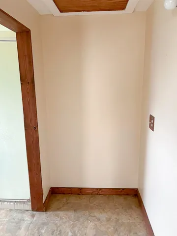 a room with table and window