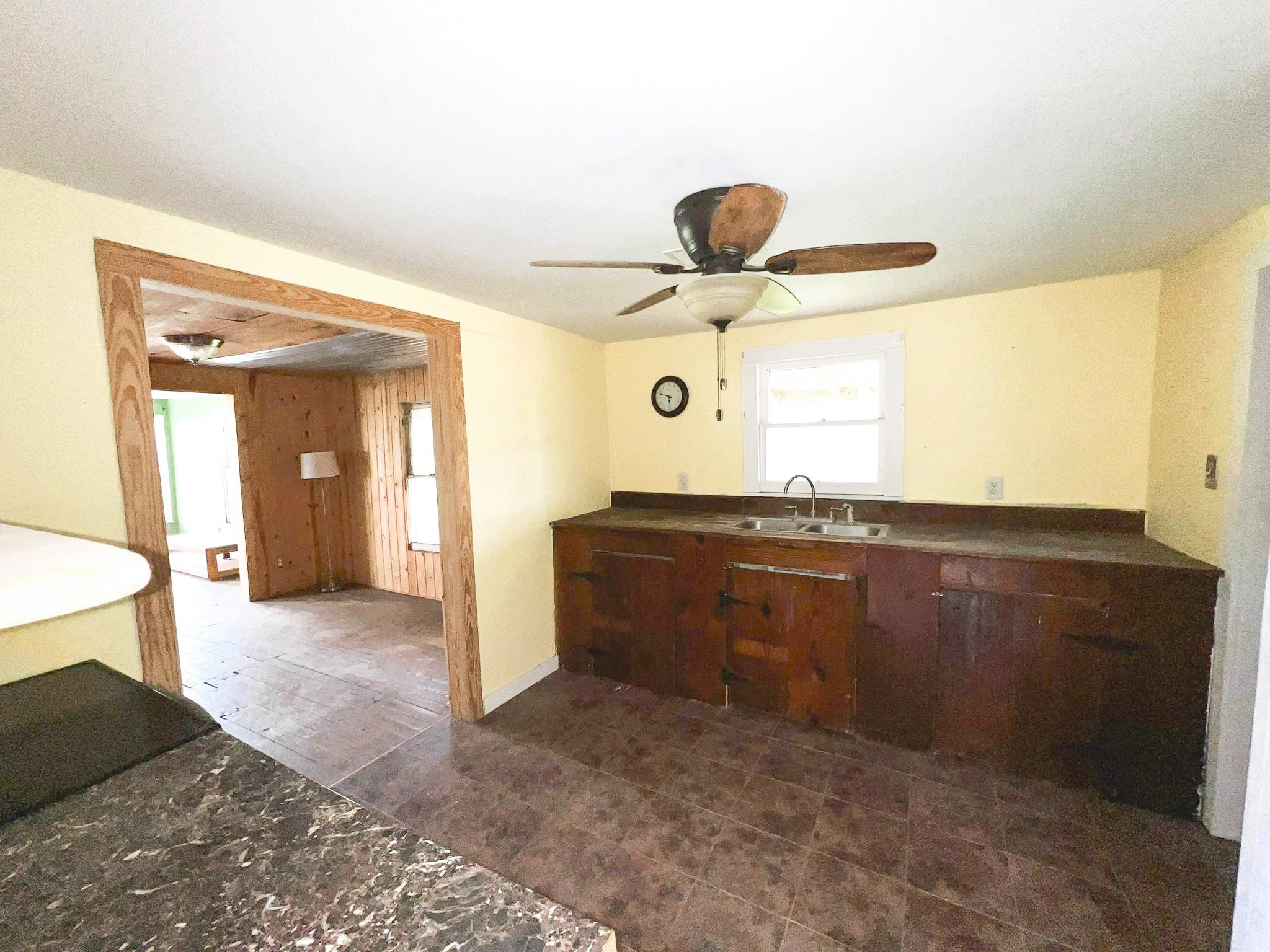 38440 Fisk Lane Pattison, TX 77423 - Photo 28 of 34 a living room with a sink and a large mirror next to a window