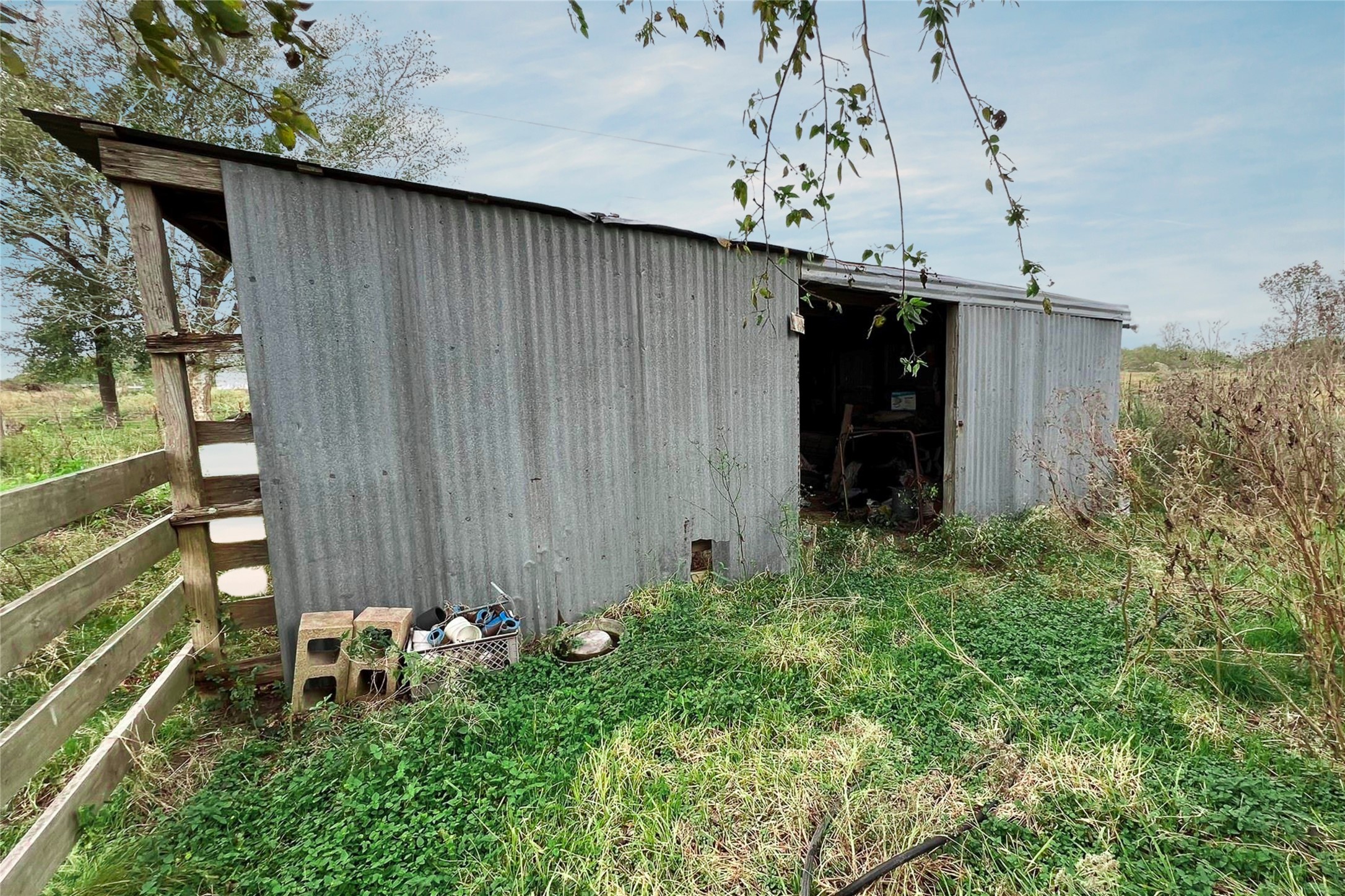 38440 Fisk Lane Pattison, TX 77423 - Photo 6 of 34 a backyard of a house with a garden and deck