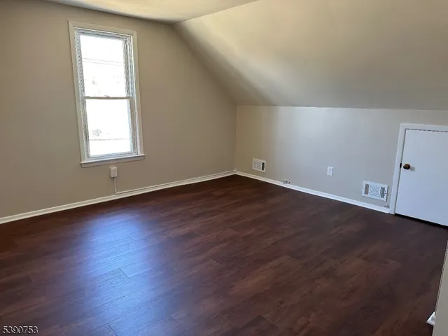 a view of a house with a street