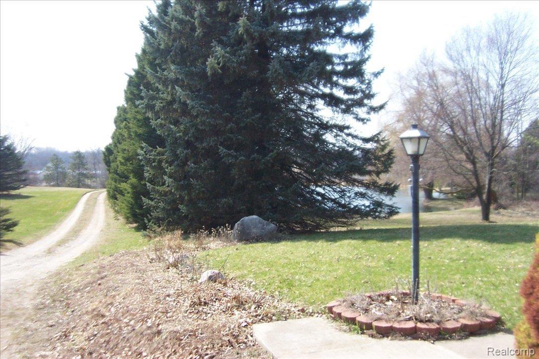 1732 North Hughes Road Howell, MI 48843 - Photo 4 of 25 set way back on hill