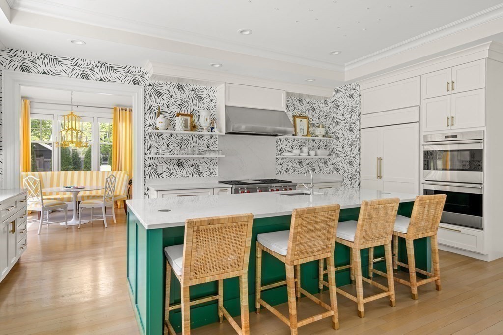 19 Crafts Road Brookline, MA 02467 - Photo 11 of 24 a view of a dining room with furniture and wooden floor