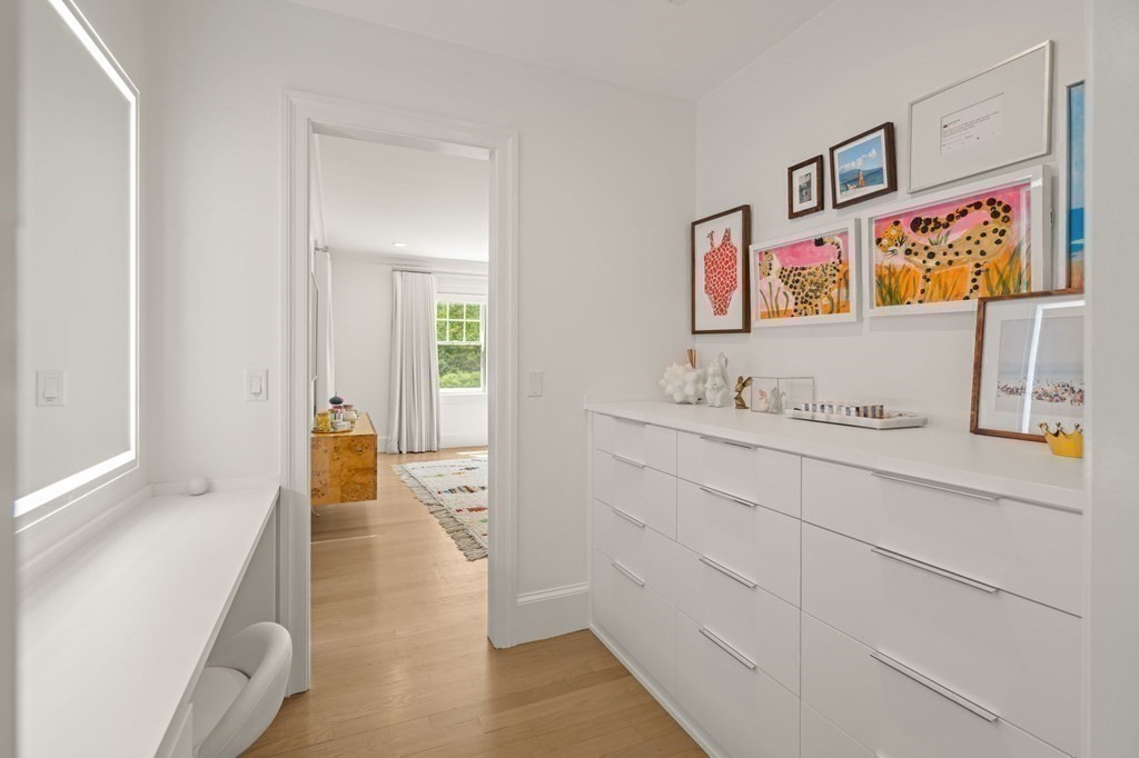 19 Crafts Road Brookline, MA 02467 - Photo 17 of 24 a bathroom with sink and mirror
