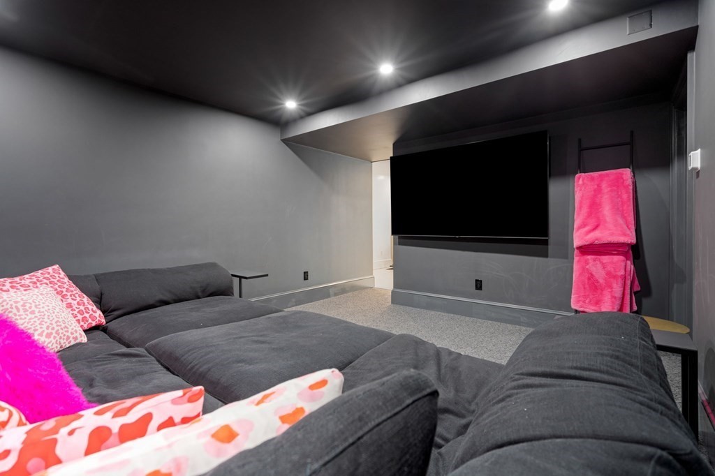 19 Crafts Road Brookline, MA 02467 - Photo 21 of 24 a living room with a couch and a flat screen tv