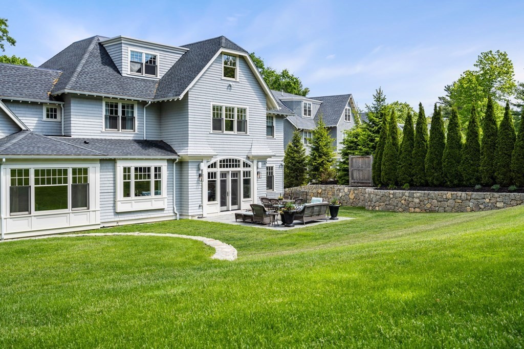 19 Crafts Road Brookline, MA 02467 - Photo 3 of 24 a view of a house with a yard and sitting area