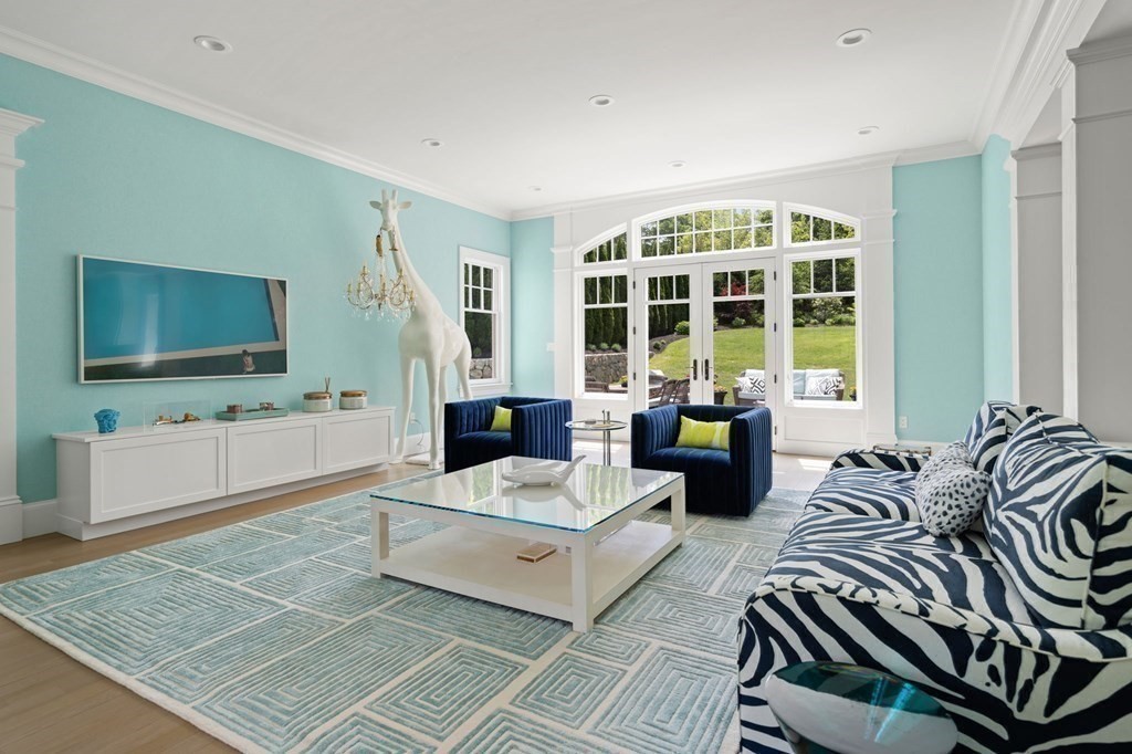 19 Crafts Road Brookline, MA 02467 - Photo 5 of 24 a living room with furniture and a flat screen tv