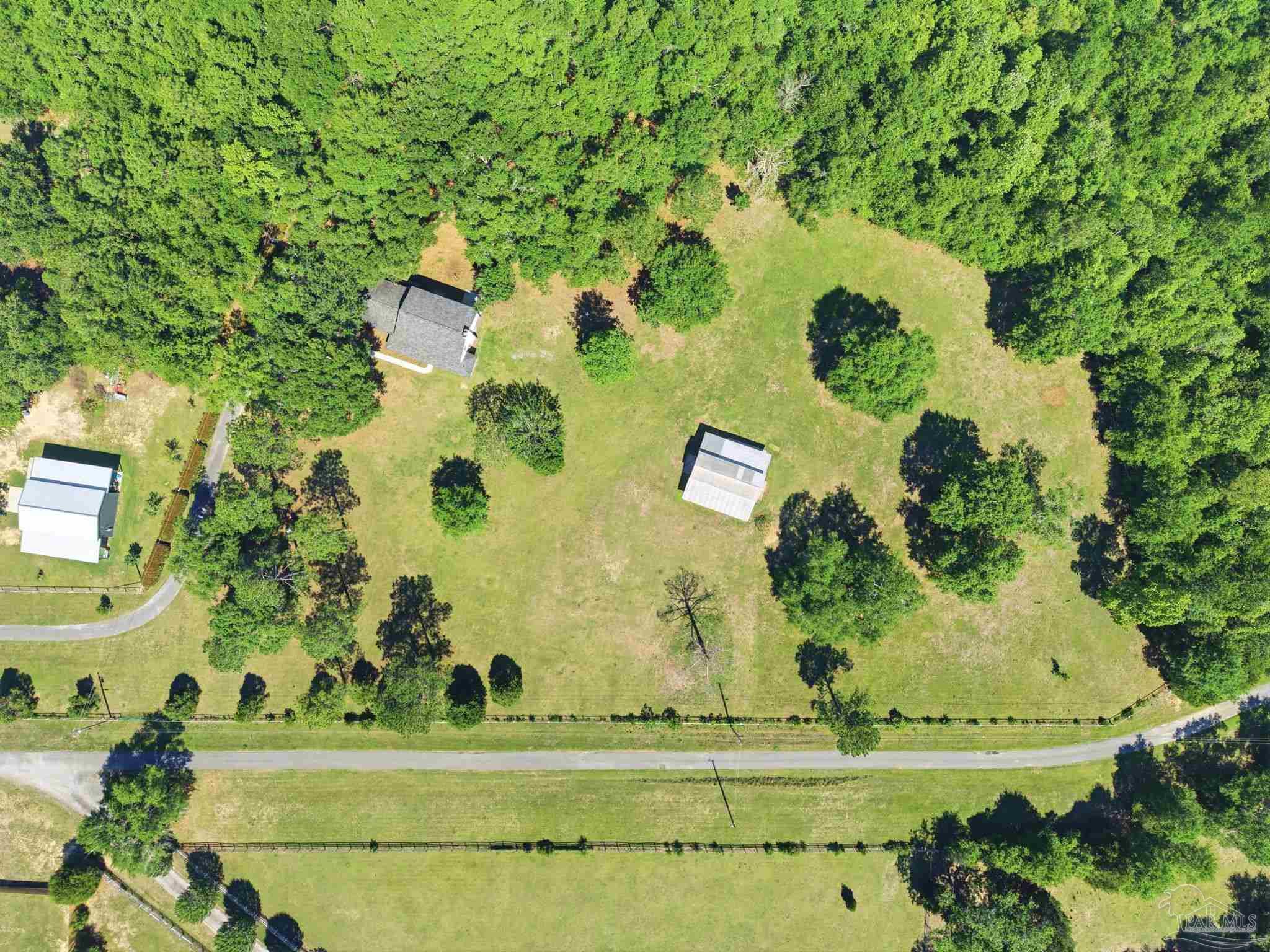 6870 Martin Road Milton, FL 32570 - Photo 46 of 48 an aerial view of a residential houses with yard