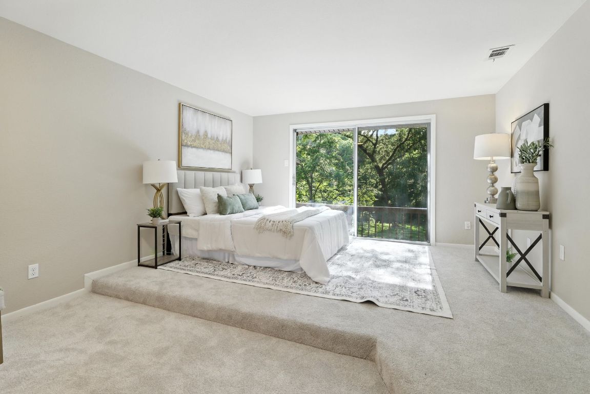 11915 River Oaks Trail Austin, TX 78753 - Photo 13 of 32 a bedroom with a bed and large window