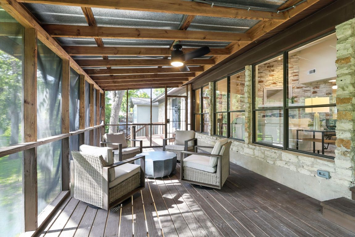 11915 River Oaks Trail Austin, TX 78753 - Photo 24 of 32 a living room with furniture and a large window