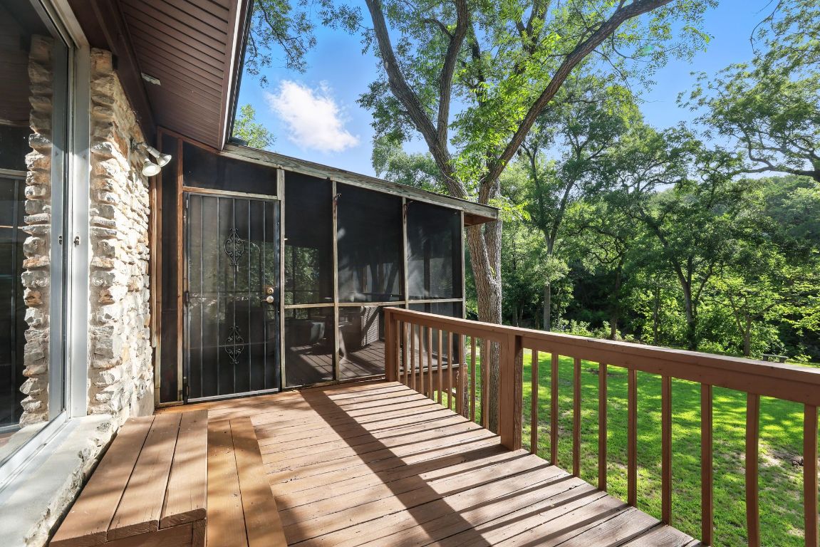 11915 River Oaks Trail Austin, TX 78753 - Photo 26 of 32 a view of balcony with wooden floor and fence