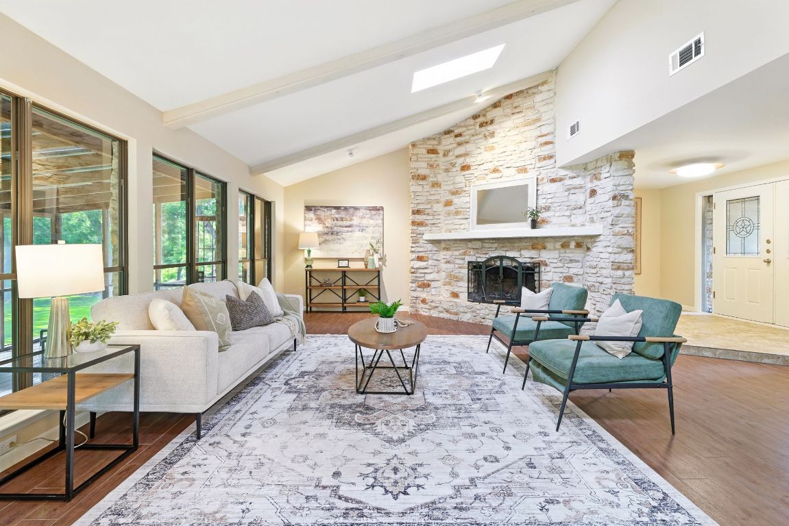 11915 River Oaks Trail Austin, TX 78753 - Photo 5 of 32 a living room with furniture fireplace and a large window