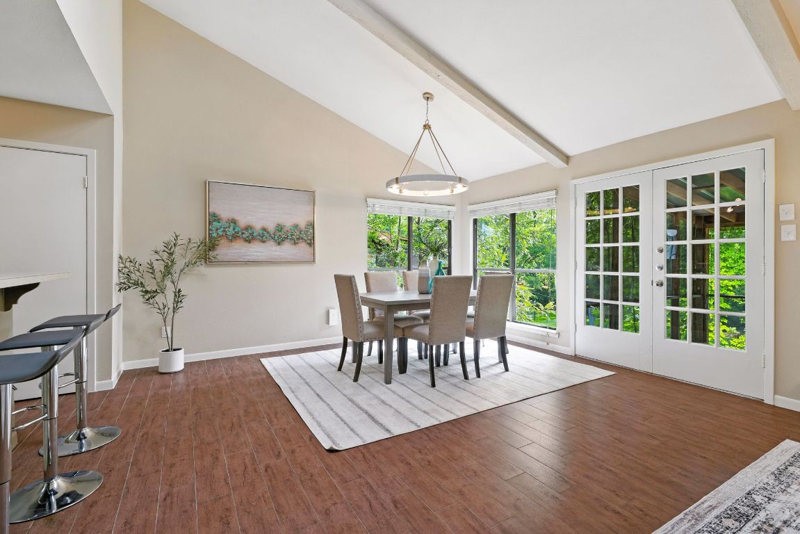 11915 River Oaks Trail Austin, TX 78753 - Photo 8 of 32 a view of a dining room with furniture window and wooden floor