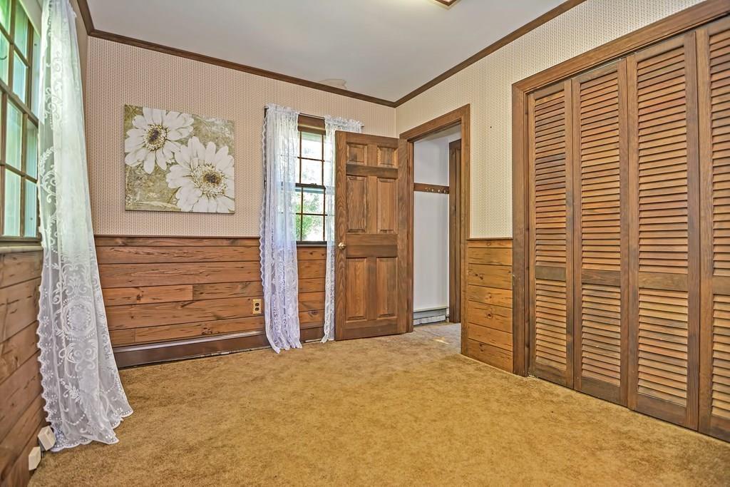 149 West Acton Road Stow, MA 01775 - Photo 15 of 42 a view of a livingroom with an empty space and a window