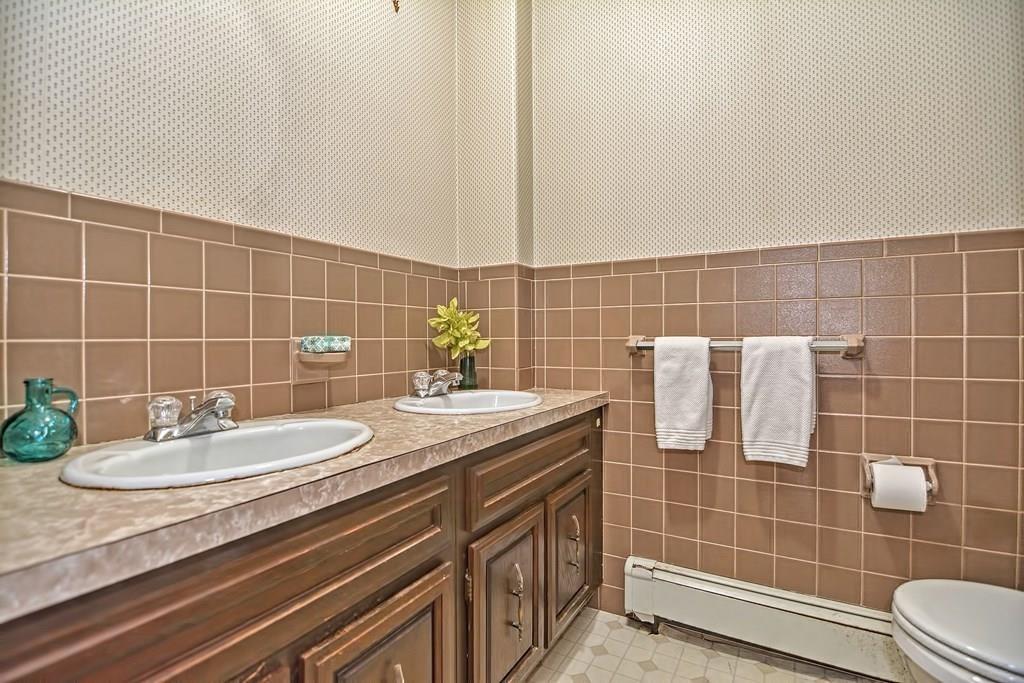 149 West Acton Road Stow, MA 01775 - Photo 16 of 42 a bathroom with a sink vanity and a mirror