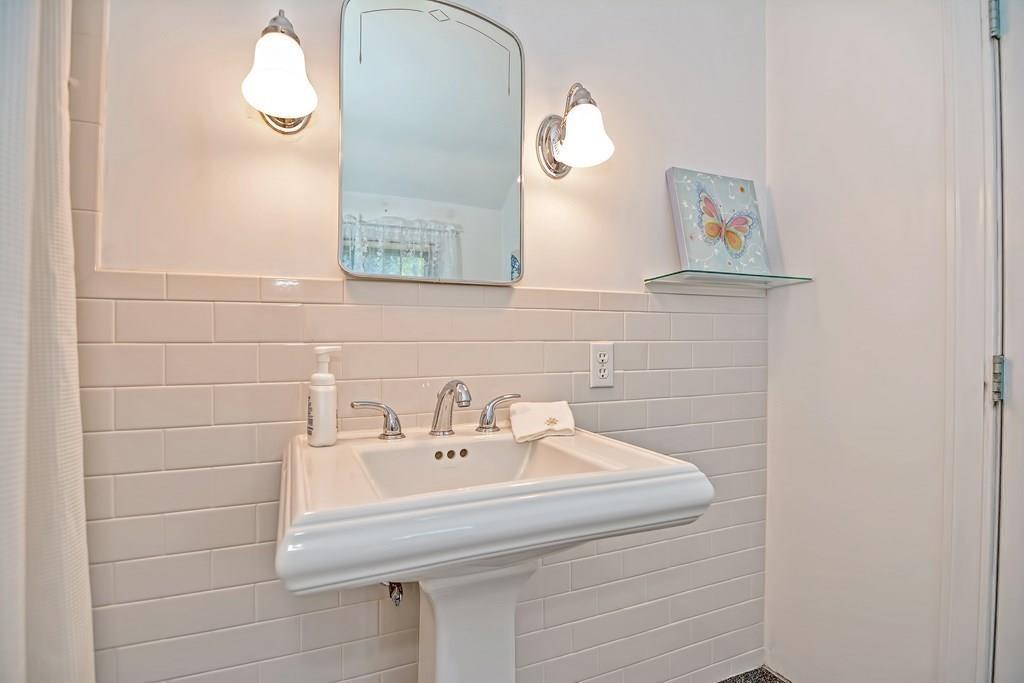 149 West Acton Road Stow, MA 01775 - Photo 20 of 42 a bathroom with a sink and a mirror