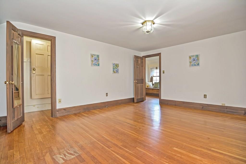 149 West Acton Road Stow, MA 01775 - Photo 24 of 42 a view of empty room with wooden floor and fan