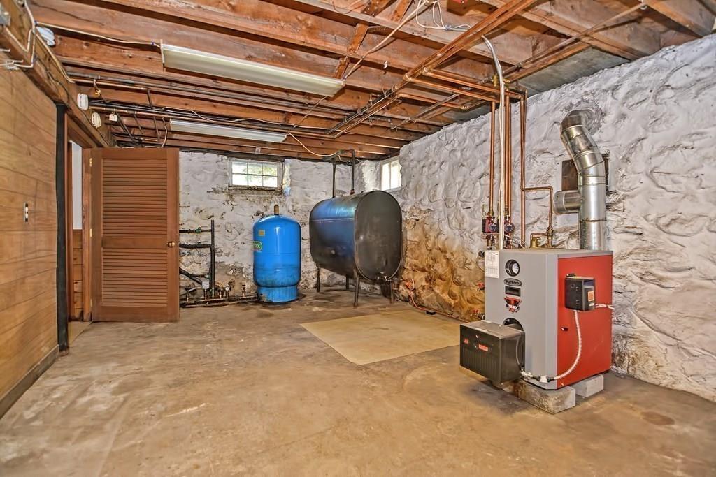 149 West Acton Road Stow, MA 01775 - Photo 29 of 42 a view of a storage room with stairs