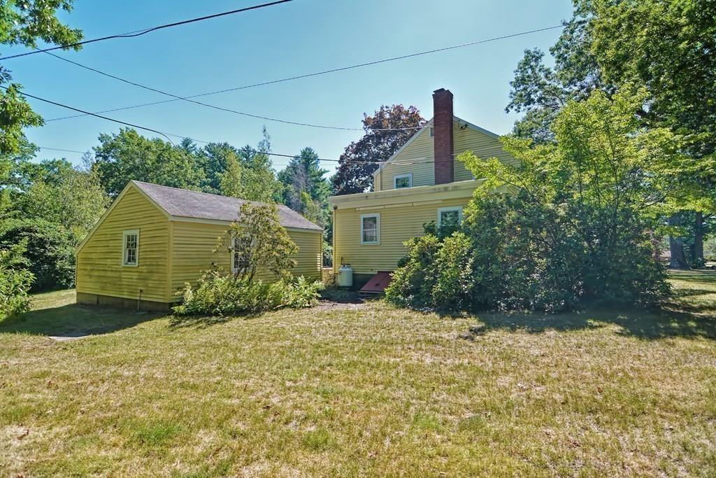 149 West Acton Road Stow, MA 01775 - Photo 31 of 42 a view of a house with a yard