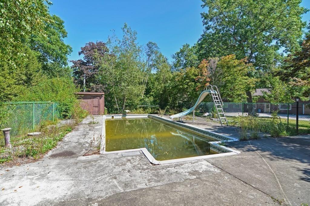 149 West Acton Road Stow, MA 01775 - Photo 41 of 42 a view of a backyard with swimming pool