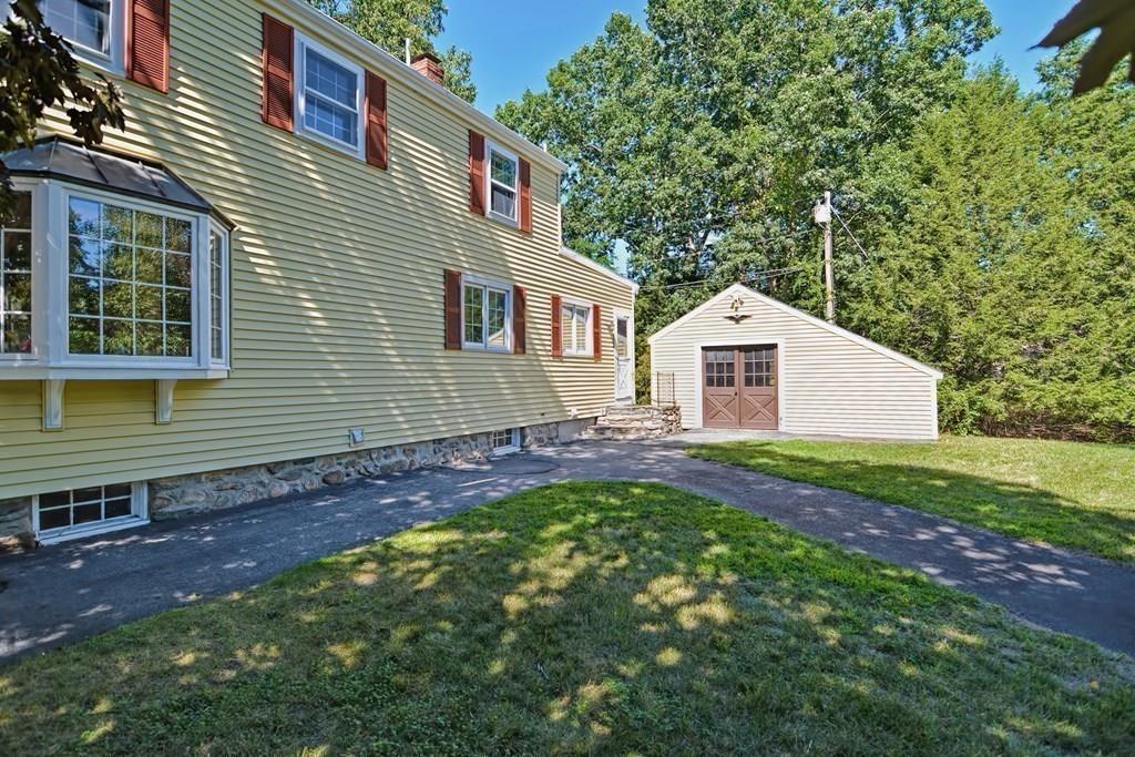 149 West Acton Road Stow, MA 01775 - Photo 6 of 42 a view of a backyard with a garden