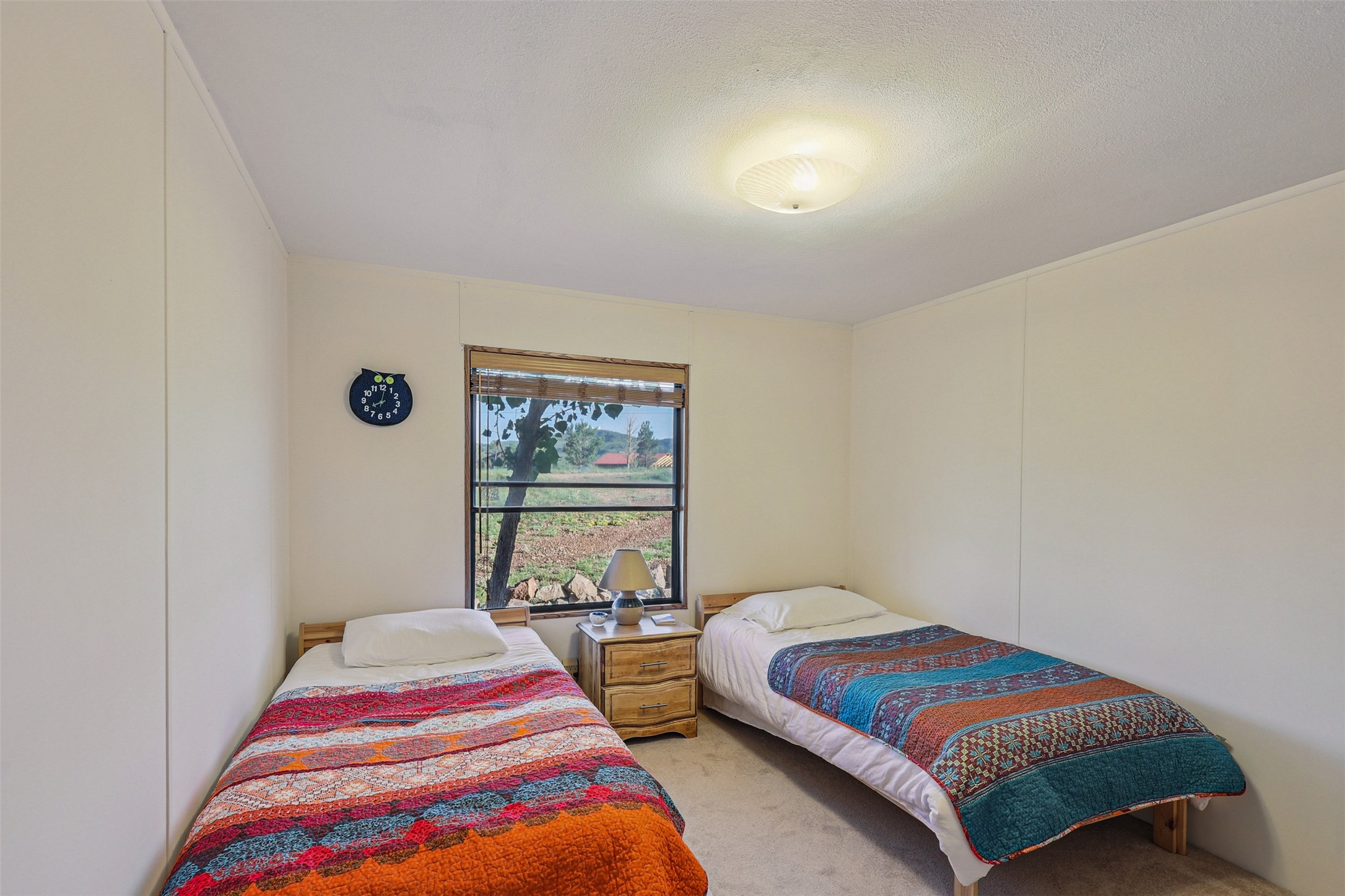 106 Ridge Line Drive Fort Davis, TX 79734 - Photo 23 of 39 a bedroom with two beds and lamp