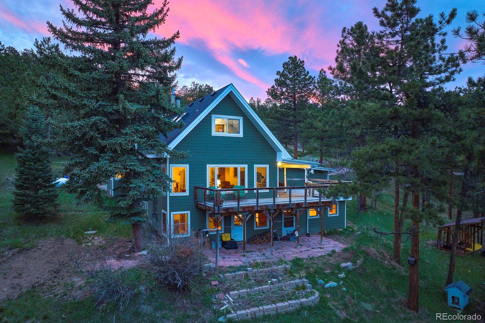 347 East Kelly Road Boulder, CO 80302 - Photo 1 of 29 front view of a house with a small yard