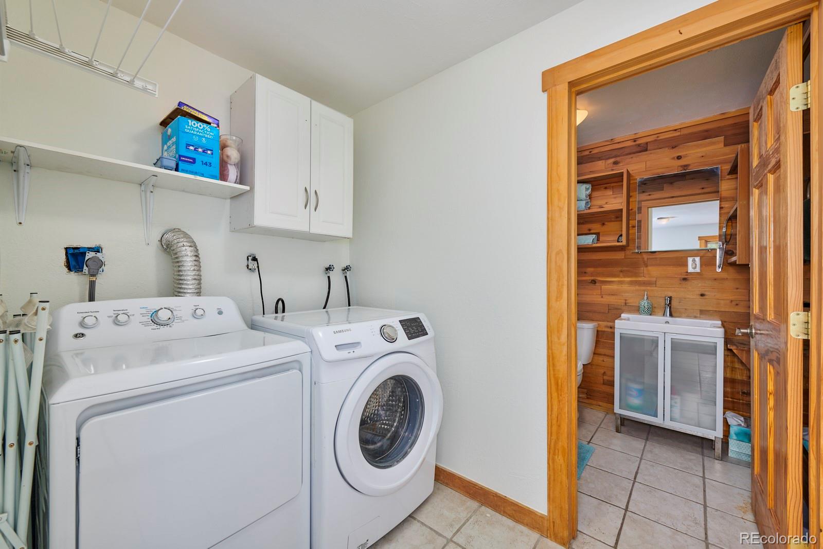 347 East Kelly Road Boulder, CO 80302 - Photo 19 of 29 a utility room with dryer and washer