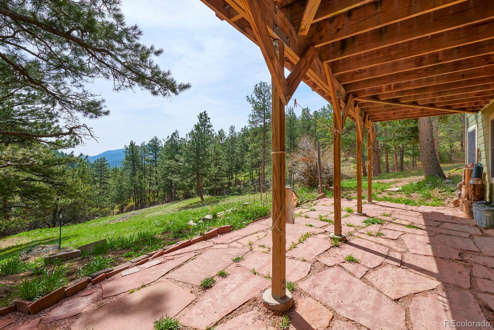 347 East Kelly Road Boulder, CO 80302 - Photo 22 of 29 a view of a backyard with a backyard