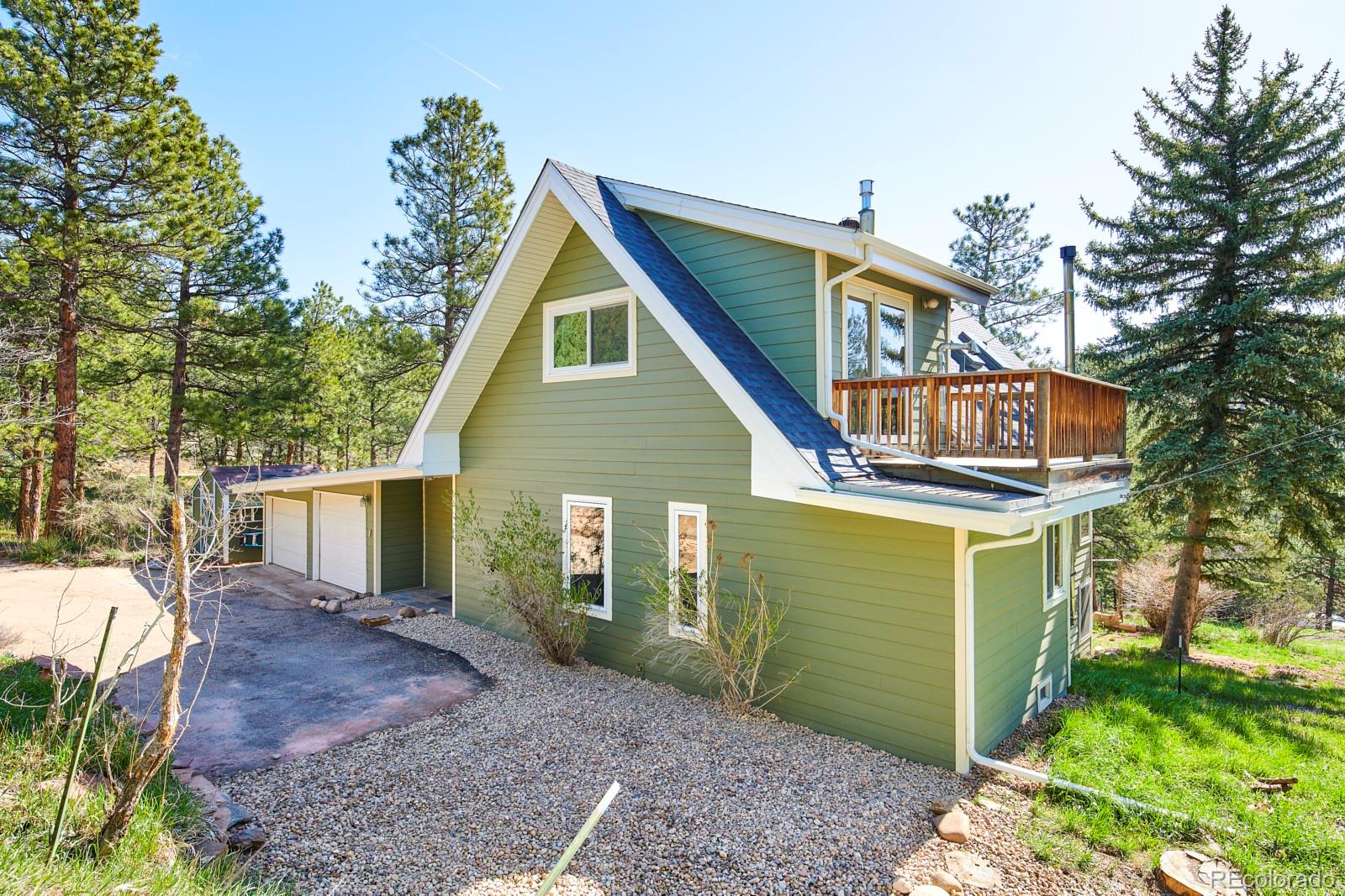 347 East Kelly Road Boulder, CO 80302 - Photo 28 of 29 a view of a house with a yard