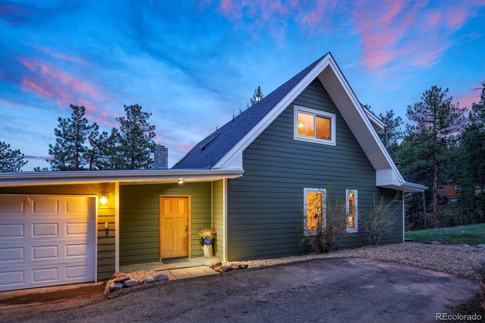 347 East Kelly Road Boulder, CO 80302 - Photo 29 of 29 a view of house with backyard space and wooden fence