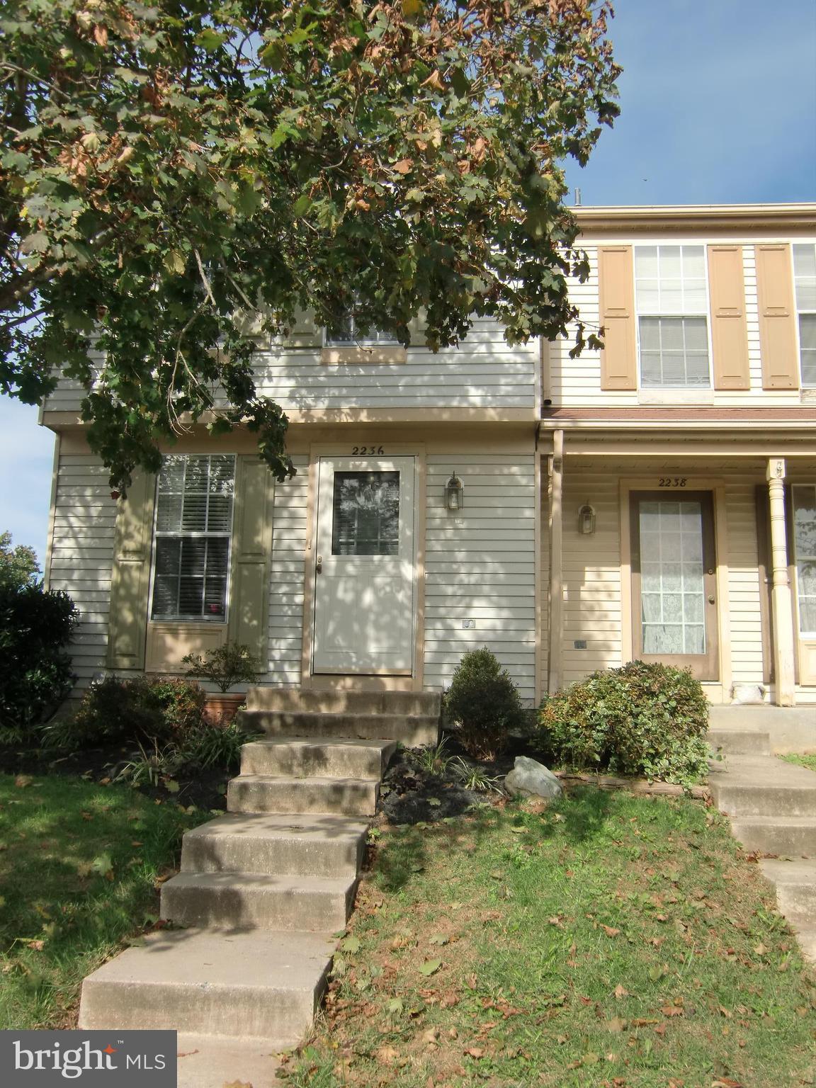 2236 Riding Crop Way Baltimore, MD 21244 - Photo 1 of 25 front view of house with a yard
