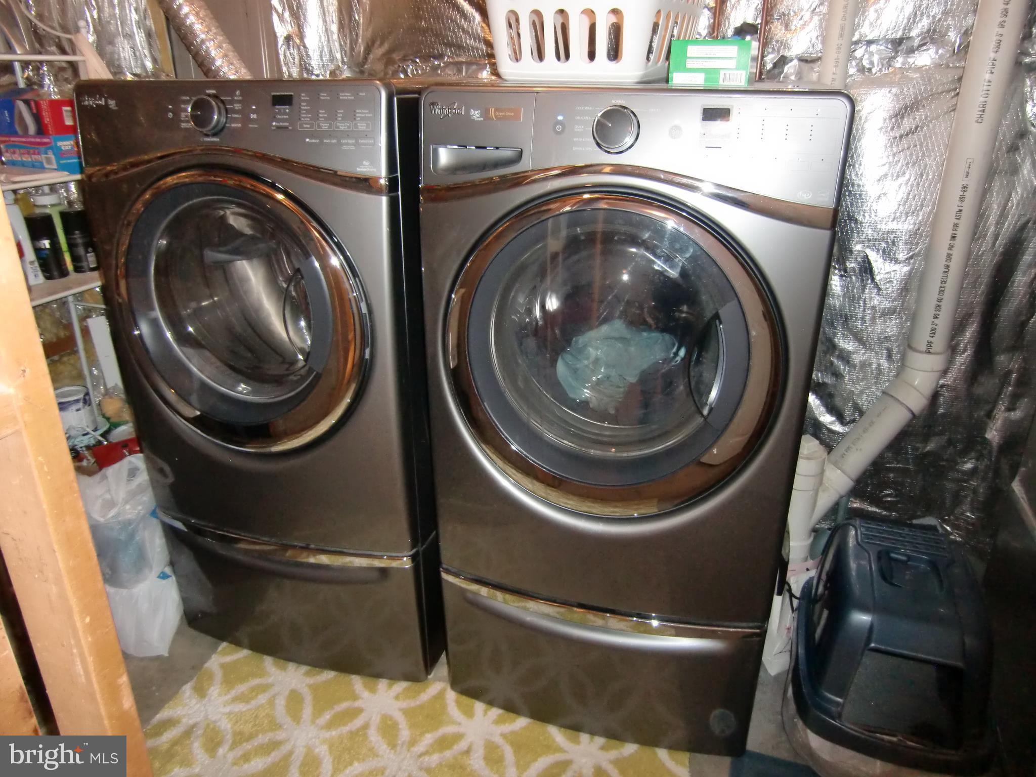 2236 Riding Crop Way Baltimore, MD 21244 - Photo 21 of 25 a close up view of a washer and dryer