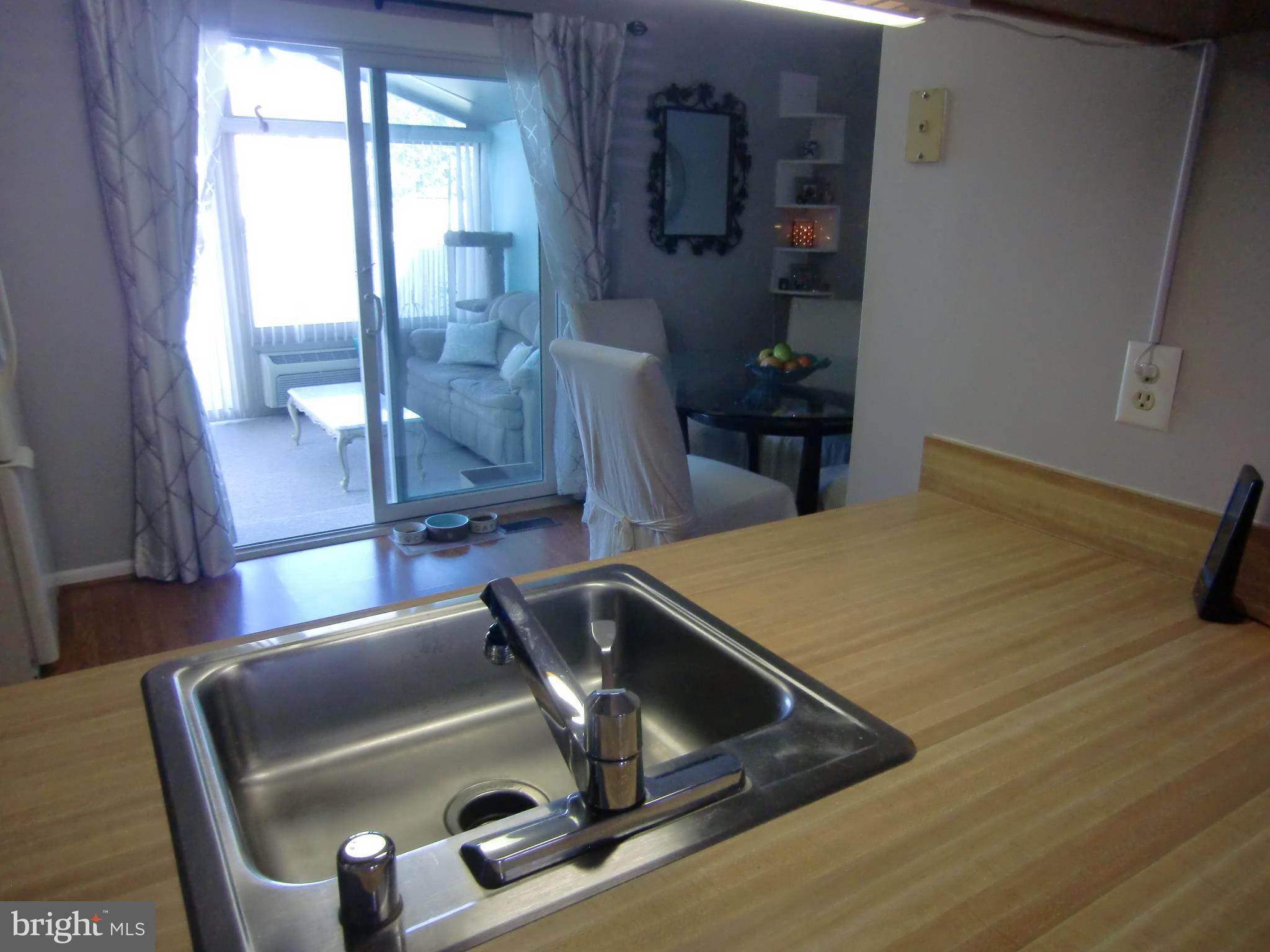 2236 Riding Crop Way Baltimore, MD 21244 - Photo 6 of 25 a room with gym equipment