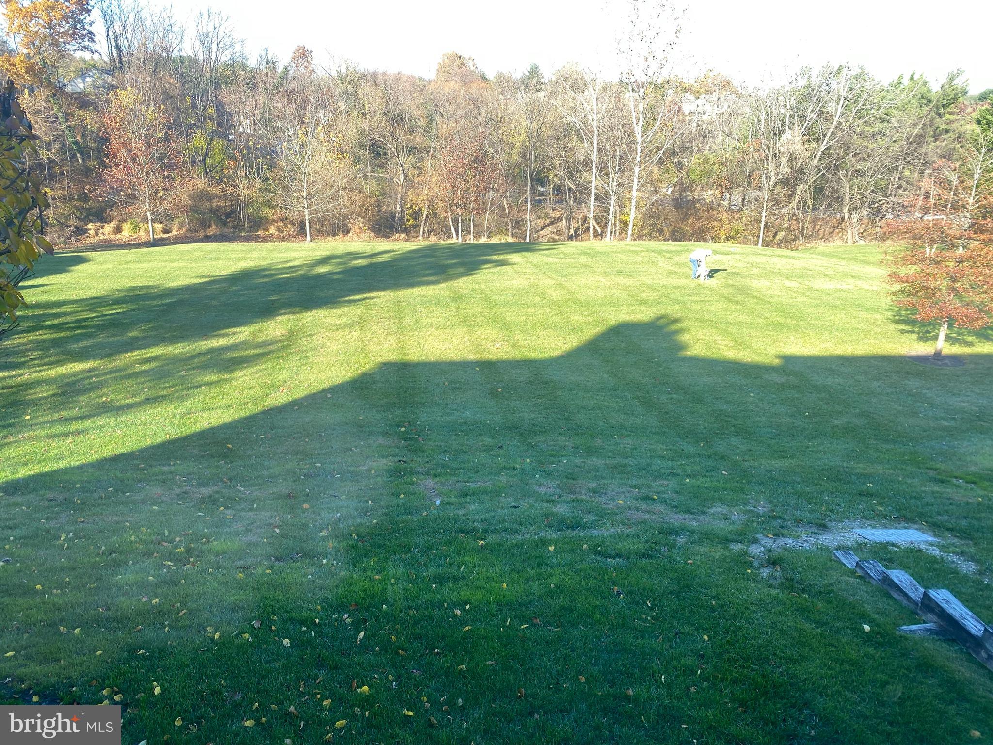 2109 B Woodbox Lane, Unit 2109B Baltimore, MD 21209 - Photo 15 of 26 a view of a yard with an outdoor space and seating area