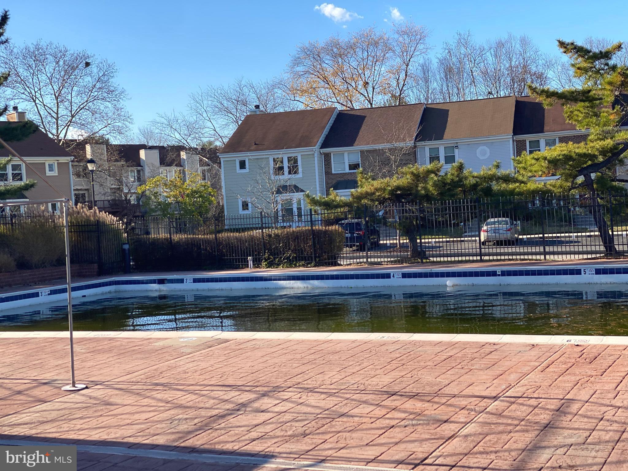 2109 B Woodbox Lane, Unit 2109B Baltimore, MD 21209 - Photo 26 of 26 a view of house with yard