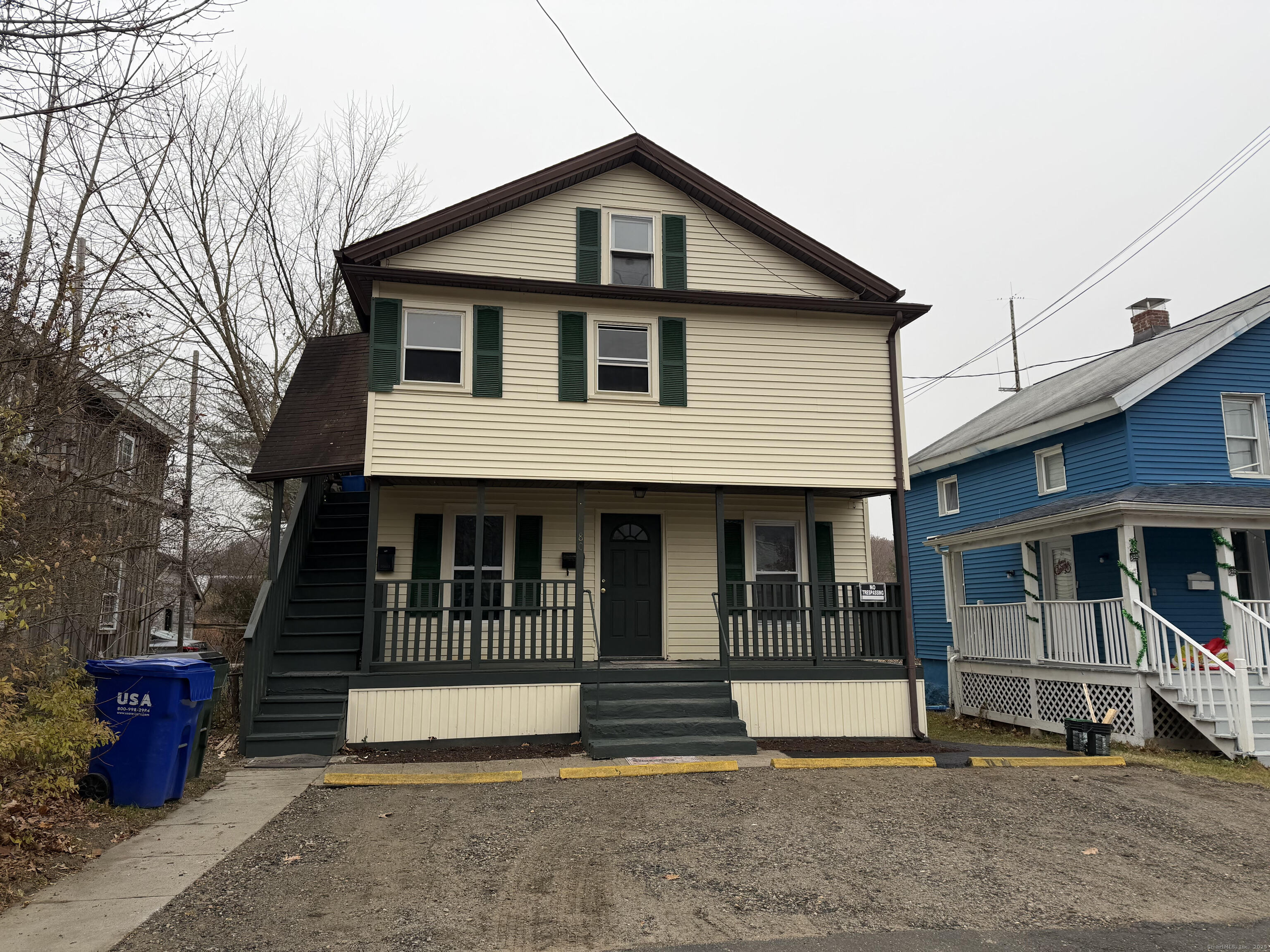 80 Gay Street, Unit 1 Winchester, CT 06098 - Photo 1 of 1 a front view of a house with a porch