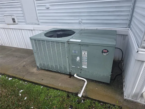 a bathroom with a sink and washing machine