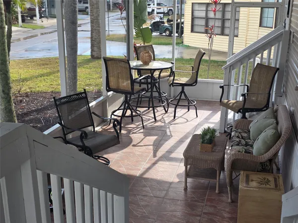 a view of an outdoor dining space with seating area