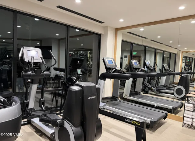 a view of a room with gym equipment