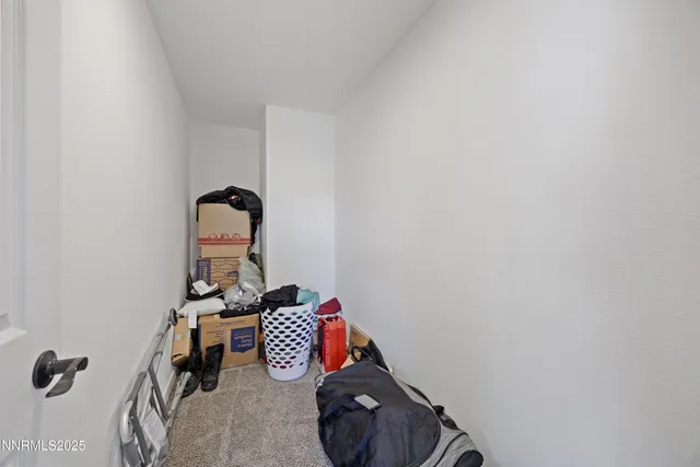 a bathroom with a sink a toilet and shower curtain