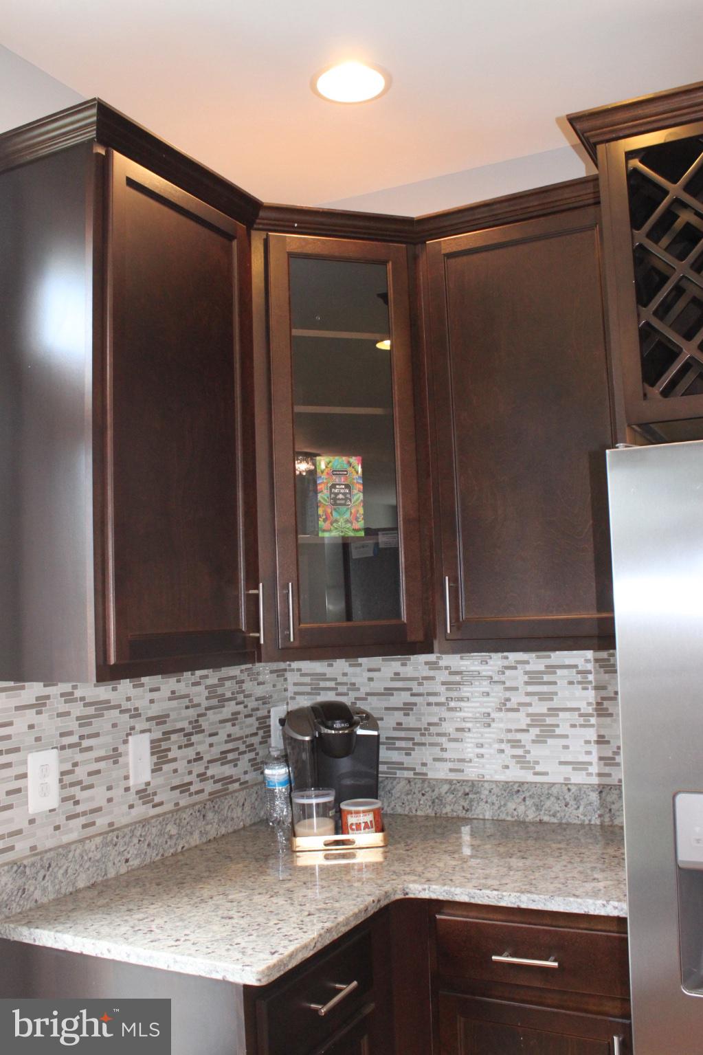 7452 Riding Meadow Way Manassas, VA 20111 - Photo 11 of 22 Sleek kitchen with modern finishes.