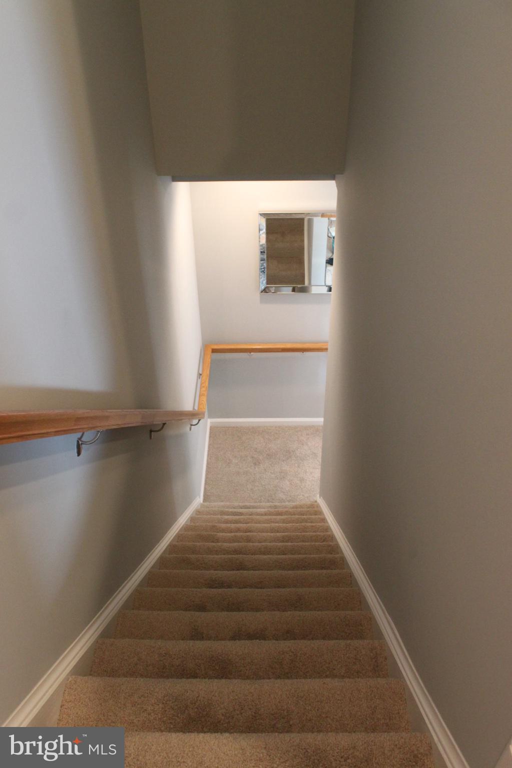 7452 Riding Meadow Way Manassas, VA 20111 - Photo 15 of 22 Inviting descent into cozy spaces.