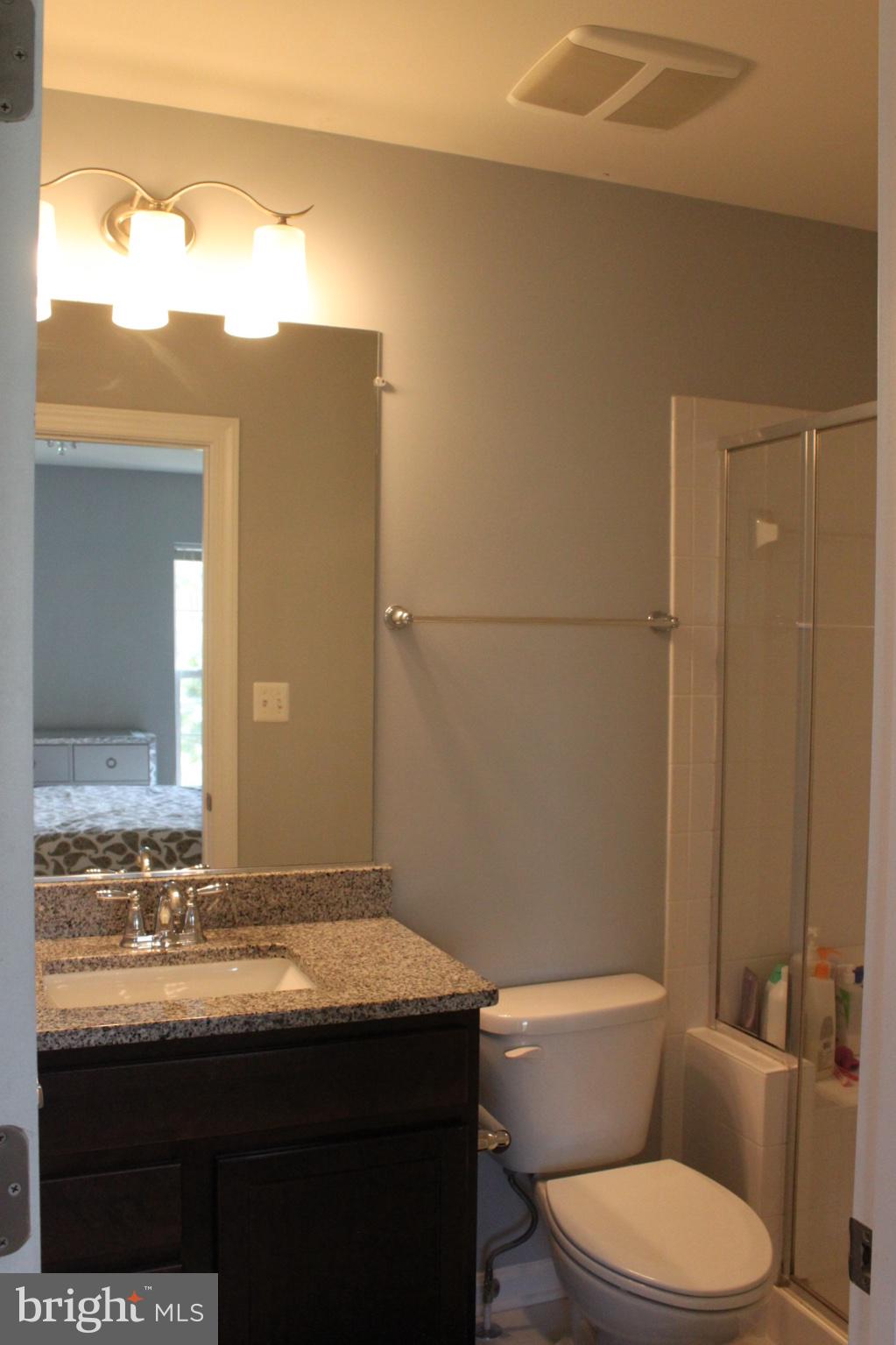 7452 Riding Meadow Way Manassas, VA 20111 - Photo 19 of 22 Modern bathroom with sleek finishes.