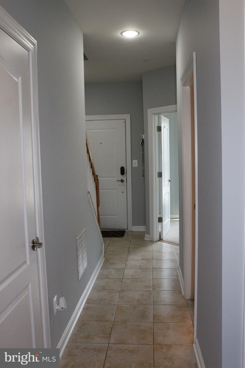 7452 Riding Meadow Way Manassas, VA 20111 - Photo 4 of 22 Inviting hallway with modern charm.