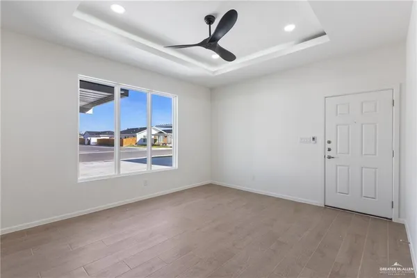 a view of an empty room with a window