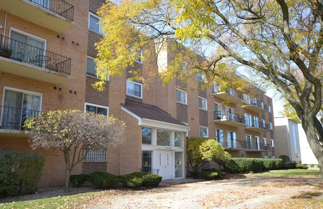 a front view of a multi story residential apartment building
