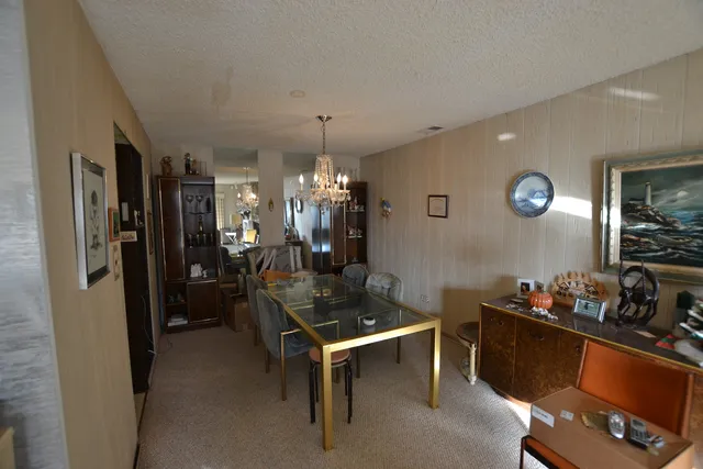 a room with furniture a rug and a window