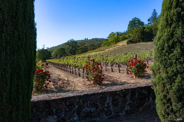 a view of a balcony with chair and table