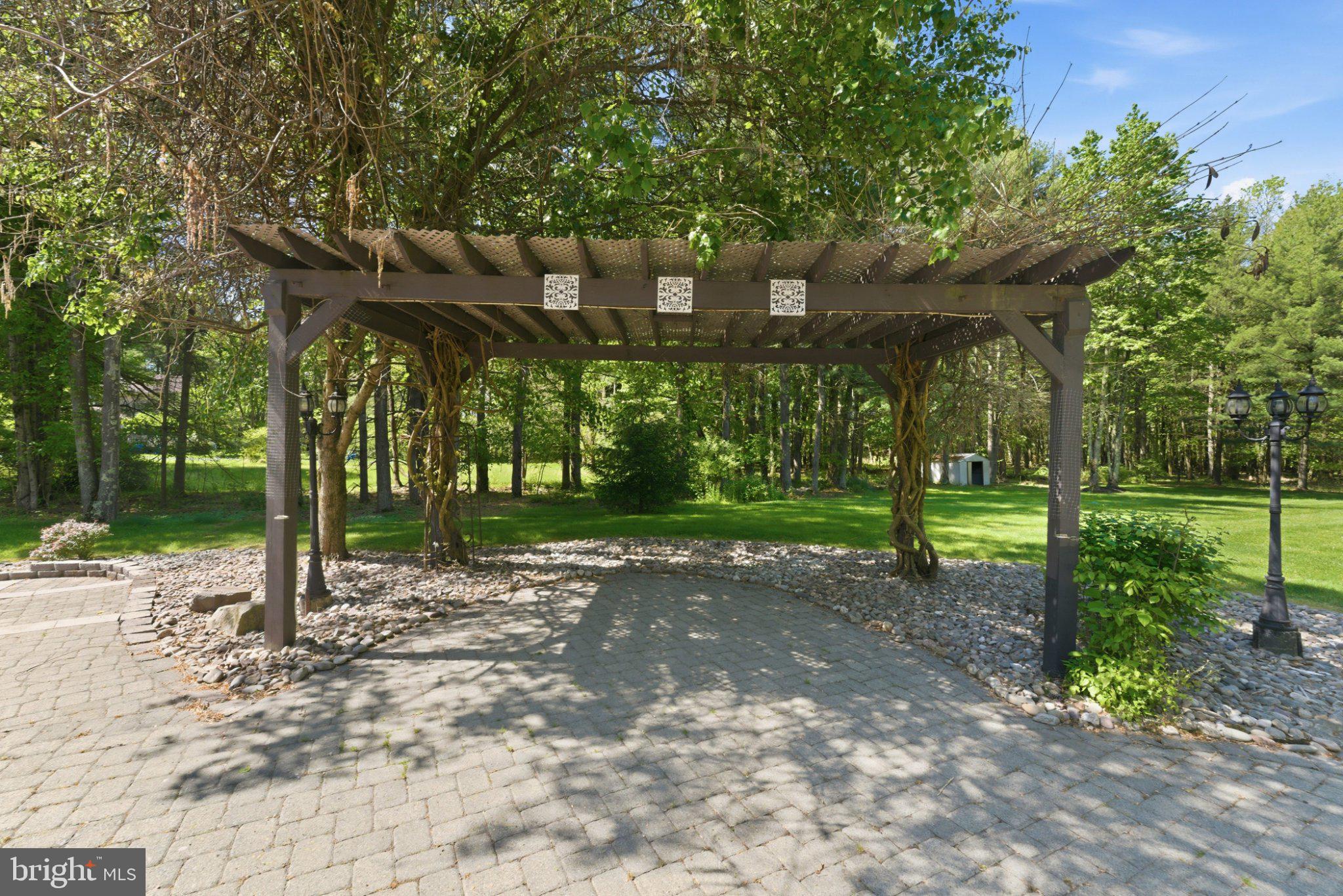 97 Union Road Frenchtown, NJ 08825 - Photo 106 of 112 Charming pergola in serene greenery.